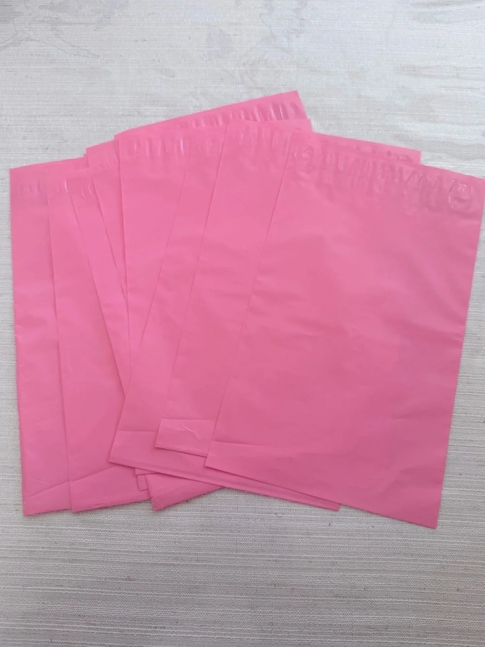15 pink polys 6in x 9in and 300 (3in x 1in) fragile stickers bundle